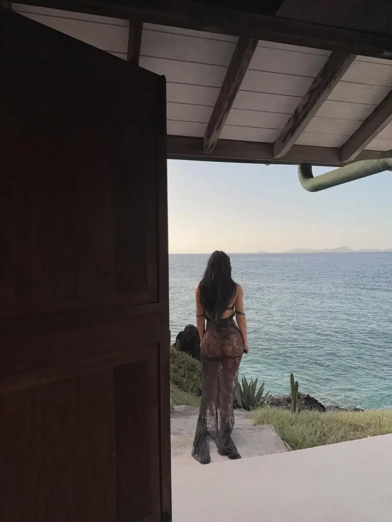 In another shot, Kim Kardashian gazed toward the ocean horizon, combining elegance and calm in a moment of quiet reflection. 
