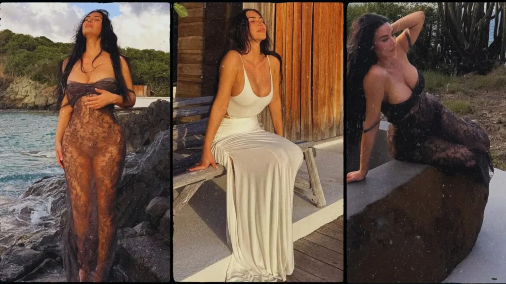 Kim Kardashian poses in a sheer black lace dress on the beach during her latest Instagram photoshoot.